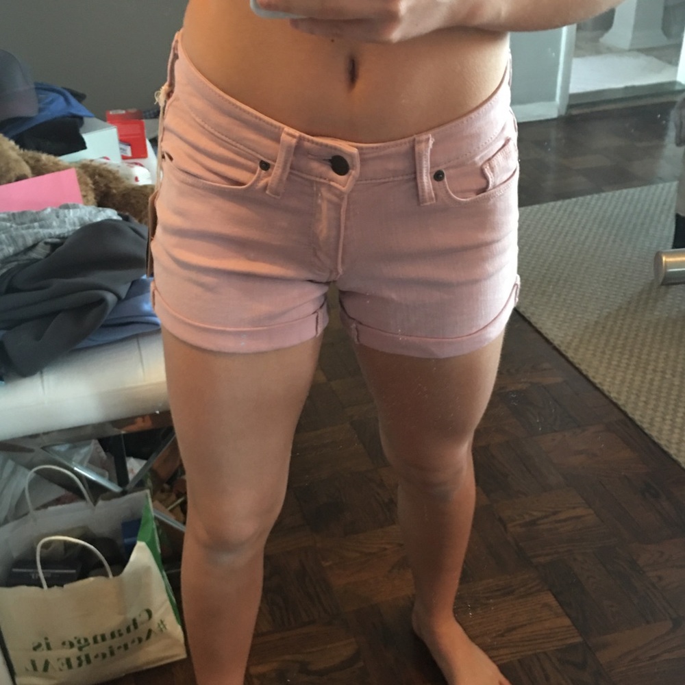 light pink mid-rise shorts